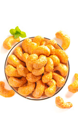 Roasted Salted Cashew Nuts in Bowl - Golden Crispy Baked Snack Food with Charred Amber Color