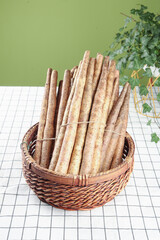 Fresh Chinese Yam Sticks in Wicker Basket - Traditional Root Vegetable from Henan Province Farm Harvest