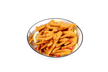Fresh Marinated Spicy Chicken Feet with Lemon and Peppers on White Plate