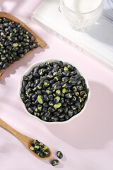 Black Mung Beans with Green Sprouts in Bowl and Wooden Spoon - Healthy Legumes for Cooking