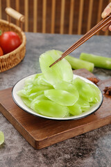 Fresh Sliced Lettuce with Chopsticks on Wooden Board - Healthy Asian Vegetable Cuisine Preparation