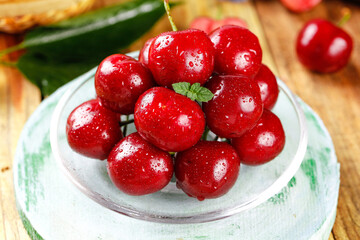 Fresh Red Cherries with Water Drops on White Plate - Healthy Summer Fruit