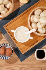 Traditional Chinese Xiao Long Bao Dumplings with Corn Meat Soup and Tea Eggs Asian Cuisine