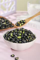 Black Beans and Green Split Peas in Bowl with Wooden Spoon - Healthy Legumes for Cooking