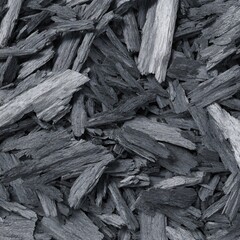 Detailed photorealistic texture shows graphite shavings creating a rich, dark, realistically abstract scene.