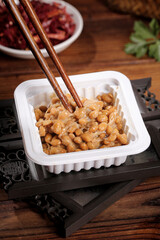 Japanese Natto Fermented Soybeans with Chopsticks Traditional Asian Food Ingredient