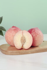 Fresh Ripe Peaches on Wooden Board - Summer Fruit Still Life