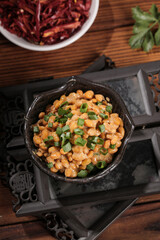 Traditional Japanese natto fermented soybeans with scallions in ceramic bowl healthy Asian cuisine