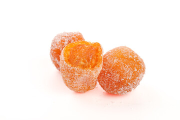 Sugar-Coated Preserved Kumquat Fruits Traditional Candied Citrus Confection on White Background