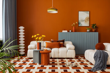Modern living room with orange wall, soft sofa and blue sideboard. Elegant design combining bold...