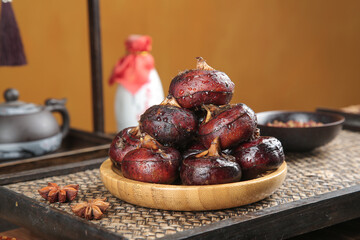 Roasted Chestnuts with Caramelized Skin in Traditional Kitchen Setting