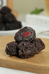 Candied Yongtai Plum Dried Fruit Traditional Chinese Snack on Wooden Board