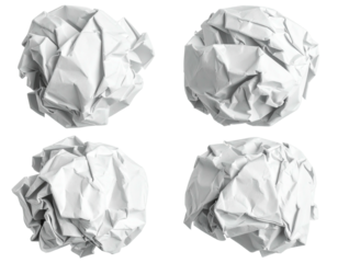 Four crumpled pieces of white paper