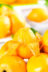 Fresh Orange Loquat Fruits Alpine Miyi Variety in White Bowls Healthy Organic Produce