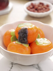 Fresh Persimmon Fruit Delicacy in White Bowl - Traditional Asian Food Photography
