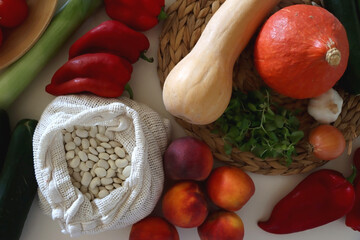 Collection of healthy fruits, vegetables and legumes on white background. Top view.