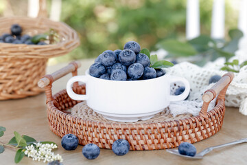 Fresh Blueberries in White Bowl on Wicker Tray - Healthy Organic Fruit Display