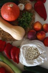 Collection of healthy fruits, vegetables and legumes on white background. Top view.