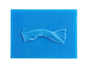 A blue rectangular object with torn tape