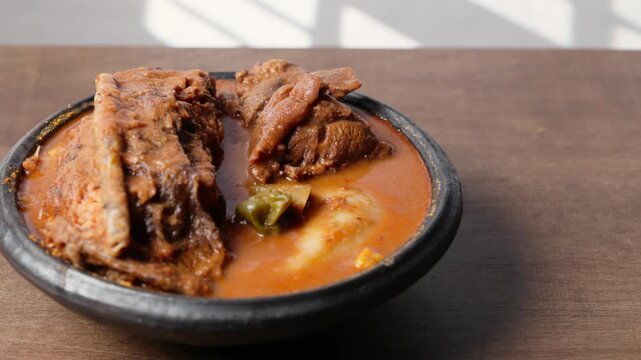 Fufu With Smoked Fish Light Soup and Goat Meat, Africa Ghana Traditional Dish