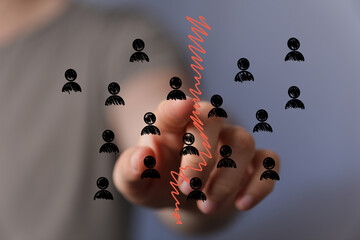 Stock photo of a finger pointing at a declining graph, symbolizing customer loss or business downturn.