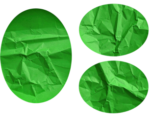 Crumpled green paper circles on black