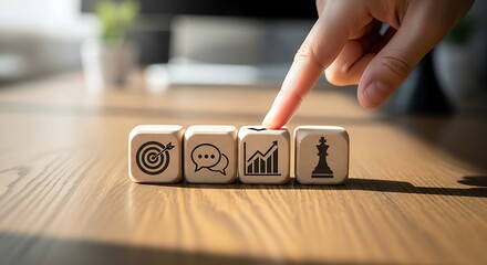 Hand chooses business strategy dice with marketing analysis and goal icons for success