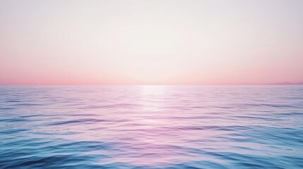 Obraz premium Serene Pink Sunset Over Calm Ocean