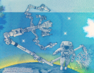 5 Dollars Canada, 2013 with the image of Dextre and canadarm2. International Space Station. Polymer money of Canada.