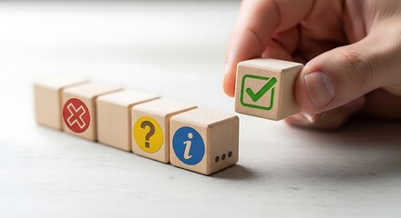 Hand placing a checkmark block on a line of decision blocks for success