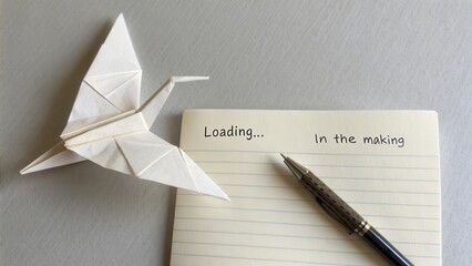 Unfinished Origami Bird Loading Note in Process of Creation