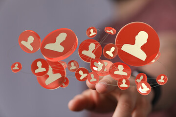 Hand interacting with a 3D network of people, representing social connections and technology integration in business and communication concept.