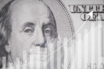 Conceptual image of US dollar with upward financial graph and arrow, symbolizing economic growth,...