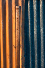 Close-Up of Orange and Blue Corrugated Metal