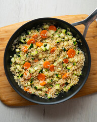 Rice paella with vegetables and salmon. Step-by-step recipe to learn how to cook.