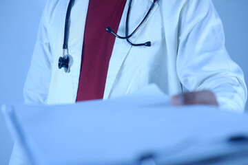 The doctor submits the patient's medical files or documents