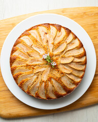 Whole-wheat cake with baked pear and cinnamon. Step-by-step recipe to learn how to cook.