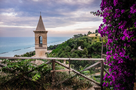 Scenic view of Adriatic Sea and a bougainvillea, by the ancient town of Marano (Cupra Marittima, Marche region)