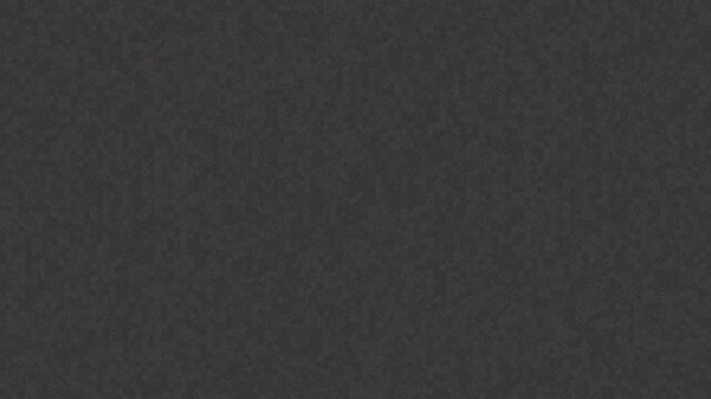 A dark gray abstract animation featuring a fine noise particle texture that gently moves and shifts over time. The dynamic motion of tiny elements creates a smooth, organic flow resembling microscopic