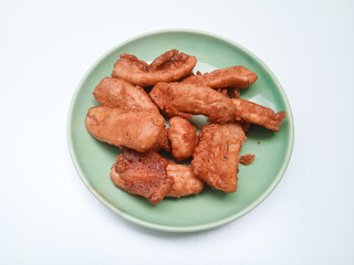 Crispy Thai fried banana ripe slices coated in coconut batter, deepfried to golden perfection. A sweet, crunchy street snack loved for its tropical flavor and texture.