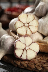 Fresh Shandong White Garlic Heads Cross Section Farm Produce in Wicker Basket