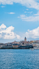 Naklejka premium Istanbul, Turkey. Scenic view of the Bosphorus Strait with city view in the background. Urban skyline and city life. 