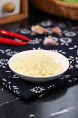 Shandong Farmers Fresh Minced Garlic Display in Bowl with Chopsticks Traditional Chinese Cooking Ingredient