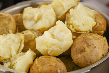 White Potatoes and Yams from Gansu Province China Cooking in Pot with Fluffy Flesh Showing