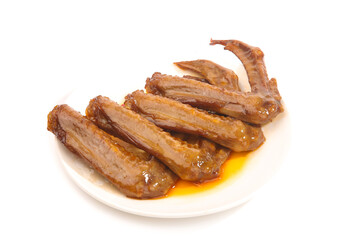 Hand-torn marinated duck wings with spicy glaze on white plate - Chinese cuisine