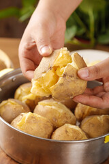 Fresh Cooked Sweet Potato in Hands - Healthy Comfort Food Preparation