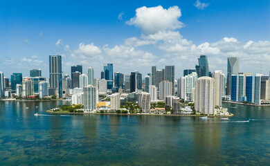 Obraz premium Aerial view of Brickell skyscrapers. Modern cityscape of downtown Miami. Panoramic Miami skyline above the coastline.