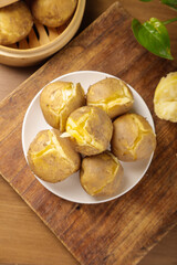 Fresh Boiled Potatoes with Golden Heart on Wooden Board - Healthy Natural Food Photography