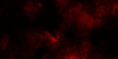 Abstract explosion of red powder on black background, freeze motion of red particles splashing, red color clouds aerial view of a forest fire with vibrant flames and smoke.