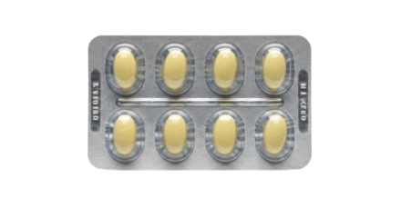 A silver blister pack containing yellow oval tablets on a white background.